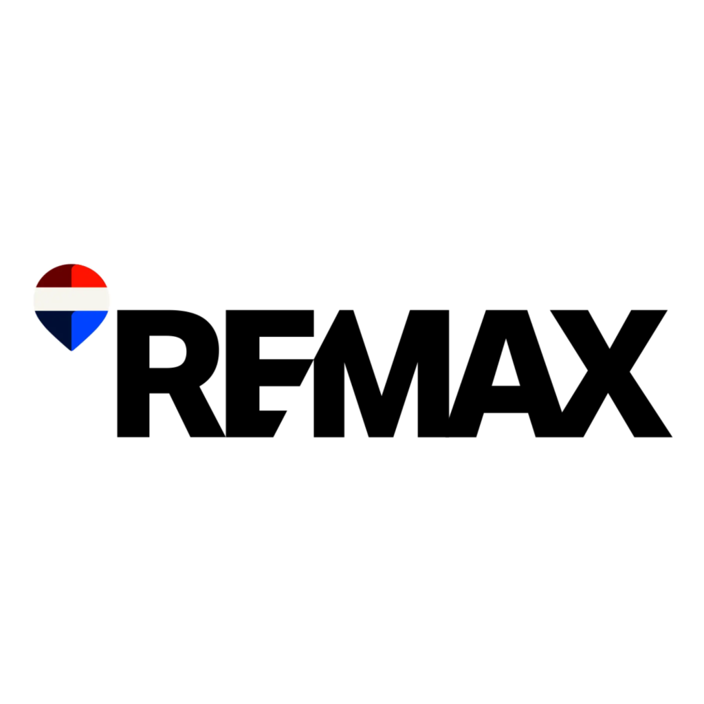 Logo for DREAMAX: a circular red-white-blue badge to the left of the bold black word DREAMAX